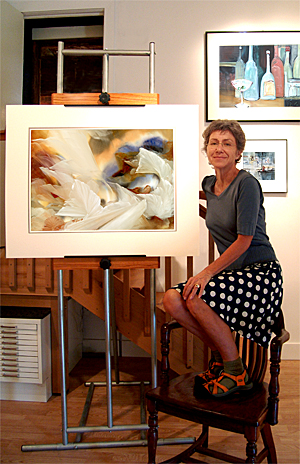 Mary with a sold painting in Museum Room. Photo for collector.